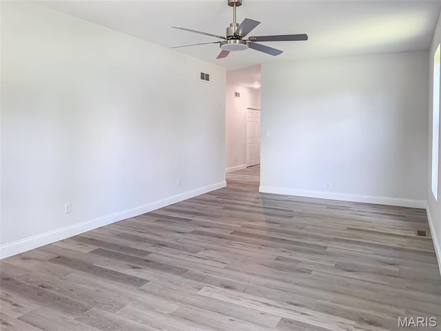 526 State St, Dupo, IL 62239 - unfurnished room with a ceiling fan, baseboards, and wood finished floors