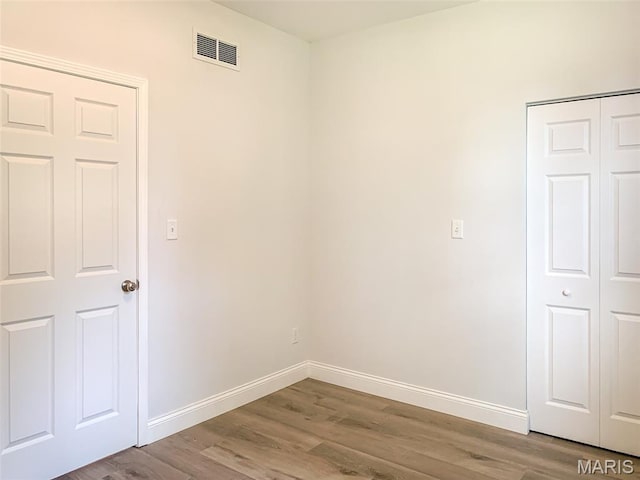 526 State St, Dupo, IL 62239 - empty room featuring baseboards and wood finished floors