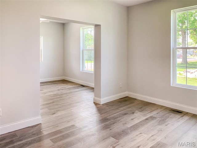 526 State St, Dupo, IL 62239 - empty room with baseboards and wood finished floors