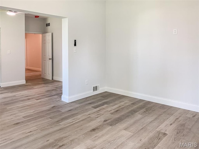 526 State St, Dupo, IL 62239 - empty room featuring wood finished floors and baseboards