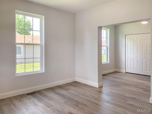 526 State St, Dupo, IL 62239 - unfurnished room with light wood-style floors and baseboards