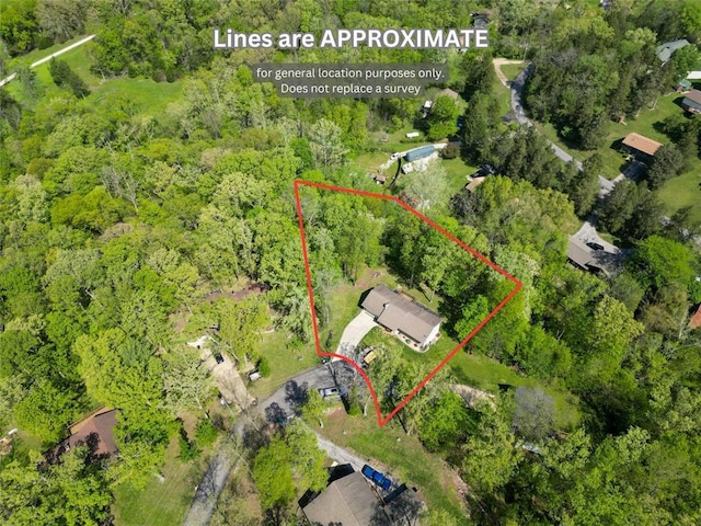 7172 Briarwood Dr, Cedar Hill, MO 63016 - aerial overview of property's location with property parcel outlined and a heavily wooded area