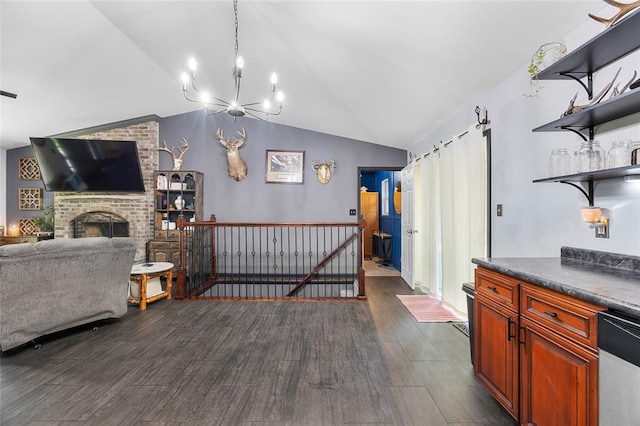 7172 Briarwood Dr, Cedar Hill, MO 63016 - kitchen featuring open shelves, a chandelier, dark wood-style floors, vaulted ceiling, and stainless steel dishwasher