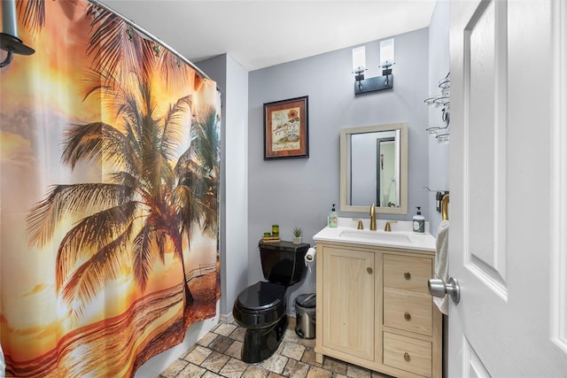7172 Briarwood Dr, Cedar Hill, MO 63016 - full bath featuring stone finish floors, vanity, toilet, and a shower with curtain