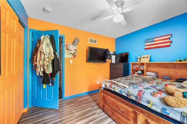 7172 Briarwood Dr, Cedar Hill, MO 63016 - bedroom featuring wood finished floors and a ceiling fan