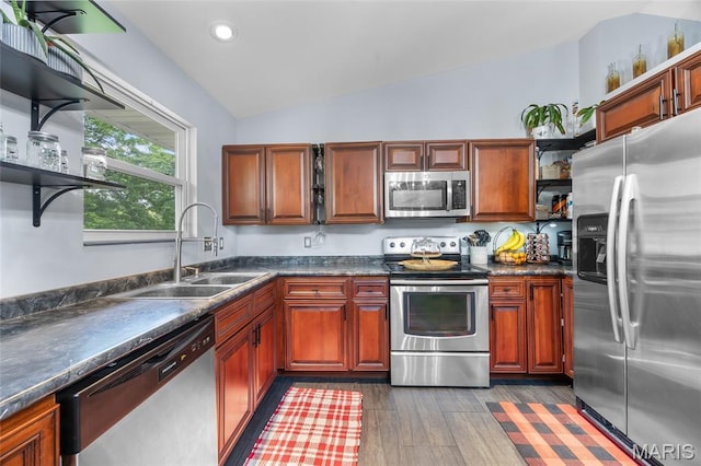 7172 Briarwood Dr, Cedar Hill, MO 63016 - kitchen featuring stainless steel appliances, open shelves, vaulted ceiling, dark countertops, and dark wood-style floors