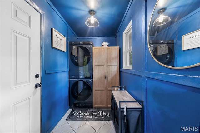 7172 Briarwood Dr, Cedar Hill, MO 63016 - laundry room with stacked washer / drying machine, tile patterned flooring, and cabinet space