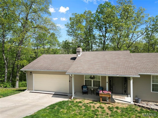 7172 Briarwood Dr, Cedar Hill, MO 63016 - view of front of home with covered porch, an attached garage, concrete driveway, a chimney, and a shingled roof