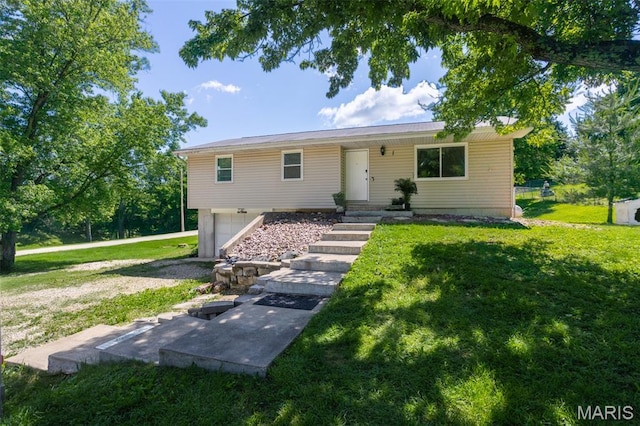 13012 Hencher Rd, De Soto, MO 63020 - ranch-style house with an attached garage and a front lawn