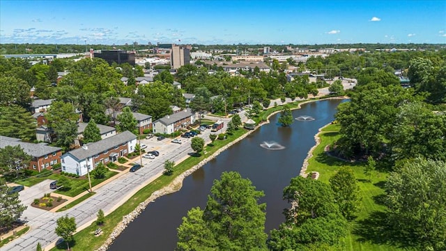 1721 Blue Jay Cv, Saint Louis, MO 63144 - aerial view of property and surrounding area with a nearby body of water and a tree filled landscape