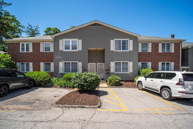 1721 Blue Jay Cv, Saint Louis, MO 63144 - townhome / multi-family property featuring uncovered parking