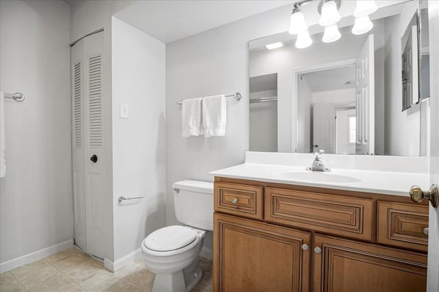 1721 Blue Jay Cv, Saint Louis, MO 63144 - bathroom with a closet, toilet, vanity, and baseboards