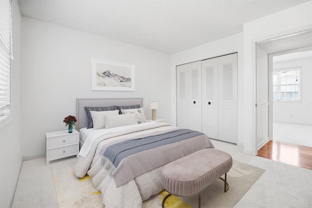 1721 Blue Jay Cv, Saint Louis, MO 63144 - bedroom with a closet, carpet flooring, and baseboards