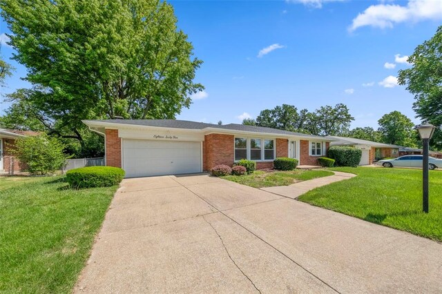 1865 Shardell Dr, Spanish Lake Township, MO 63138 - single story home featuring an attached garage, concrete driveway, and brick siding