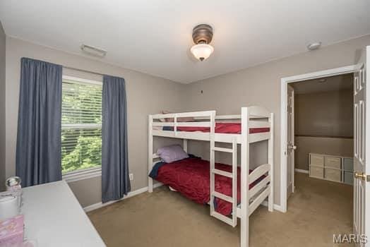 538 Springhurst Pkwy, Ofallon, MO 63368 - bedroom featuring carpet floors and baseboards