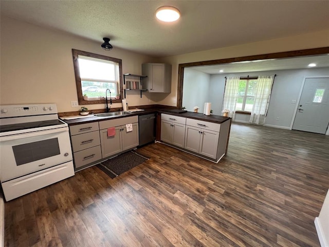 108 Gray St, Sullivan, MO 63080 - kitchen featuring white electric range, a sink, dark countertops, dishwasher, and dark wood-style floors