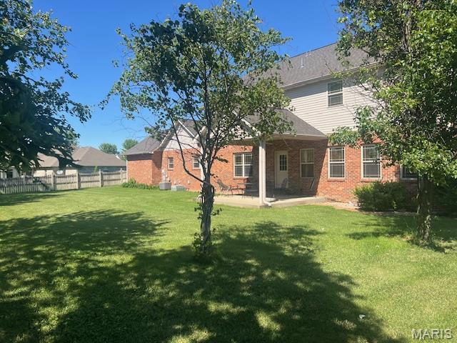 6517 Augies Way Pl, Millstadt, IL 62260 - rear view of house with brick siding and a patio