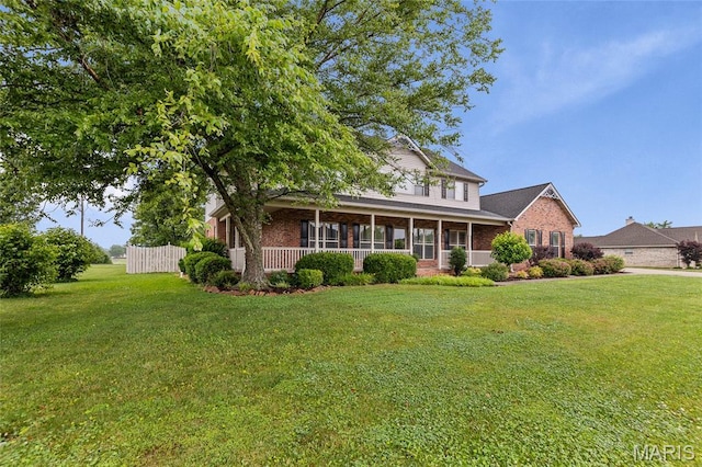 6517 Augies Way Pl, Millstadt, IL 62260 - traditional home with brick siding and a sunroom