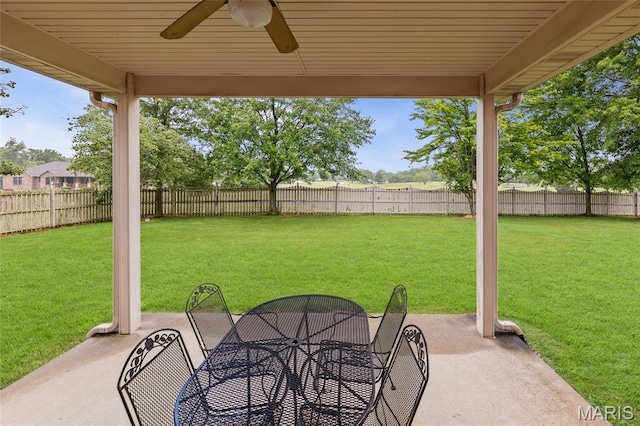 6517 Augies Way Pl, Millstadt, IL 62260 - fenced backyard with outdoor dining space, a patio, and a ceiling fan
