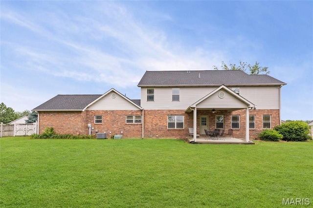 6517 Augies Way Pl, Millstadt, IL 62260 - rear view of house with a ceiling fan, brick siding, and a patio area