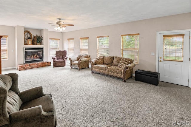 6517 Augies Way Pl, Millstadt, IL 62260 - living area with carpet, a ceiling fan, and a fireplace