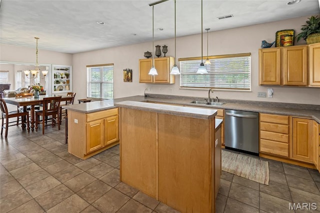6517 Augies Way Pl, Millstadt, IL 62260 - kitchen with stainless steel dishwasher, a kitchen island, recessed lighting, a chandelier, and decorative light fixtures