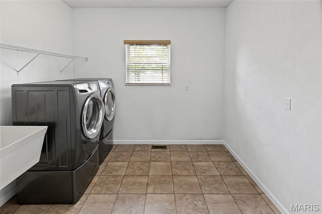 6517 Augies Way Pl, Millstadt, IL 62260 - washroom with washer and clothes dryer and baseboards