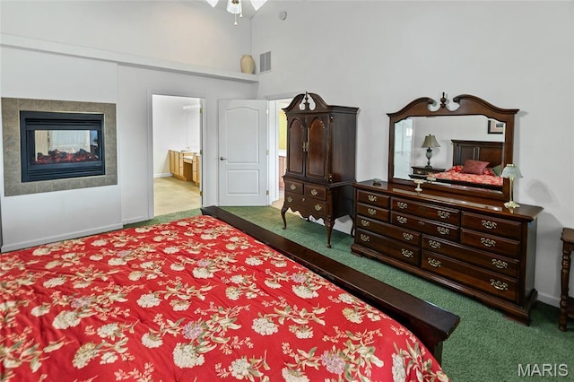 6517 Augies Way Pl, Millstadt, IL 62260 - bedroom with carpet, a high ceiling, a multi sided fireplace, and connected bathroom