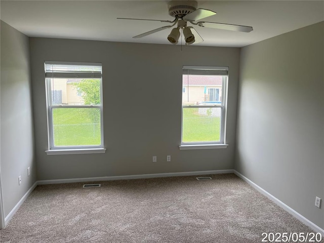14 Mandy Ct, Troy, MO 63379 - carpeted spare room with plenty of natural light, ceiling fan, and baseboards