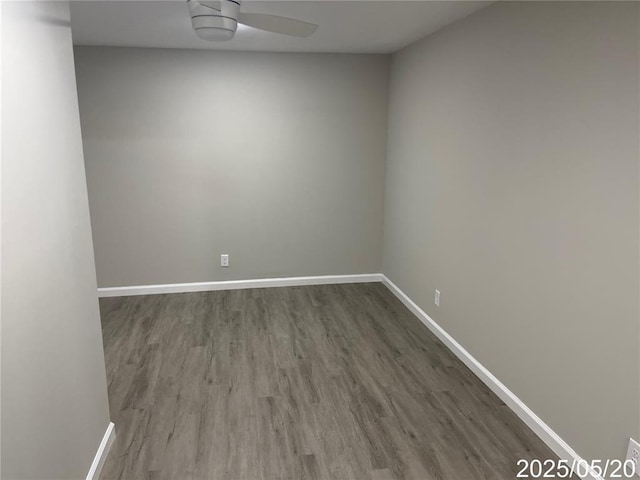 14 Mandy Ct, Troy, MO 63379 - unfurnished room featuring dark wood-style flooring, baseboards, and a ceiling fan