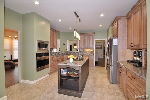 15 Eagles Way Ln, Lake St Louis, MO 63367 - kitchen with stainless steel appliances, open shelves, decorative backsplash, light stone countertops, and recessed lighting