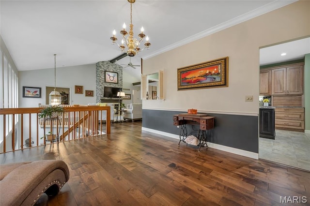 15 Eagles Way Ln, Lake St Louis, MO 63367 - hallway featuring a chandelier, an upstairs landing, wood finished floors, lofted ceiling, and ornamental molding