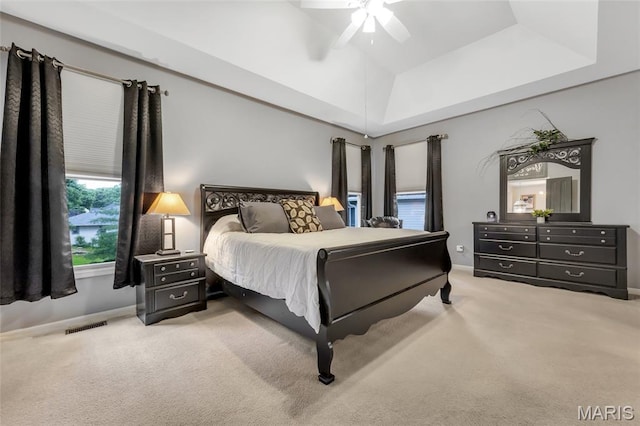 15 Eagles Way Ln, Lake St Louis, MO 63367 - bedroom with carpet flooring, a ceiling fan, and a raised ceiling