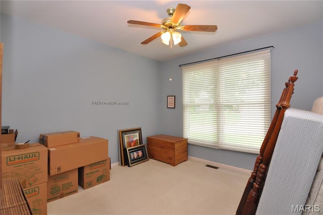 15 Eagles Way Ln, Lake St Louis, MO 63367 - carpeted bedroom with baseboards and ceiling fan