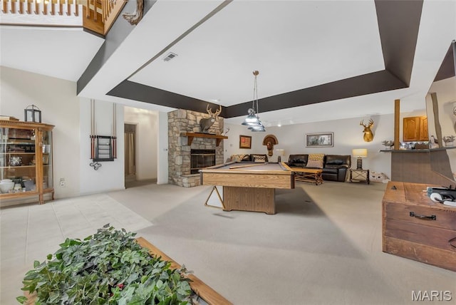 15 Eagles Way Ln, Lake St Louis, MO 63367 - playroom featuring a stone fireplace, billiards table, and light carpet