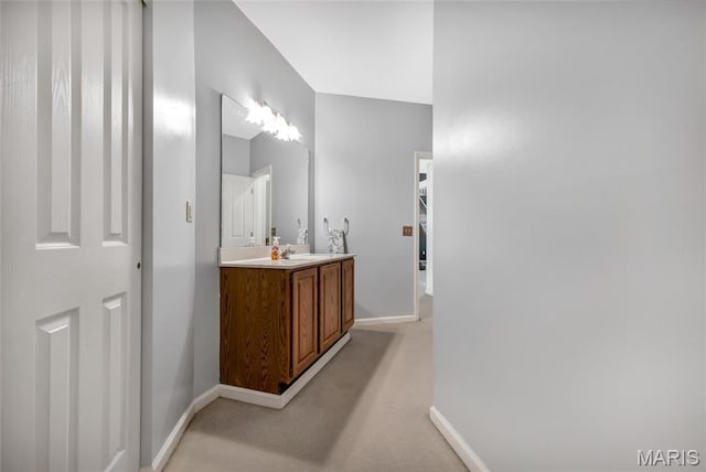 15 Eagles Way Ln, Lake St Louis, MO 63367 - bathroom with baseboards and vanity