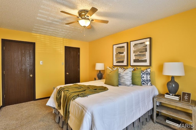 2223 Highland Hill Drive E, Saint Peters, MO 63376 - carpeted bedroom featuring a textured ceiling, two closets, and ceiling fan