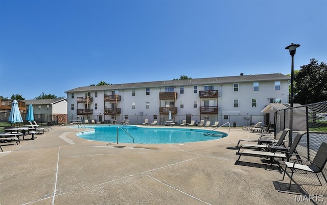 2223 Highland Hill Drive E, Saint Peters, MO 63376 - community pool featuring a patio area