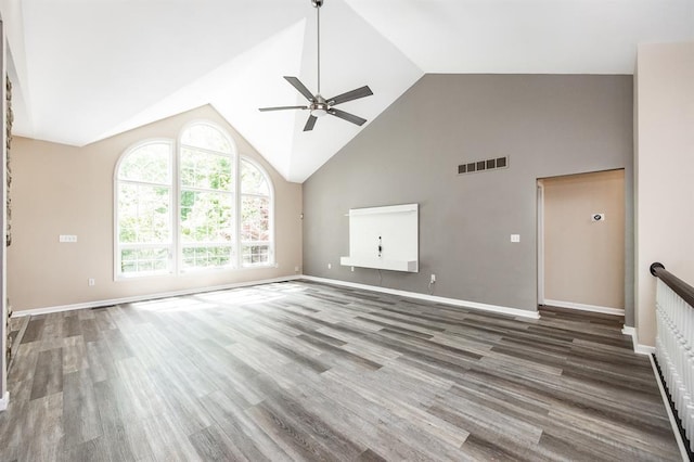 3 Wedgewood Ct, Edwardsville, IL 62025 - unfurnished living room featuring ceiling fan, wood finished floors, high vaulted ceiling, and baseboards