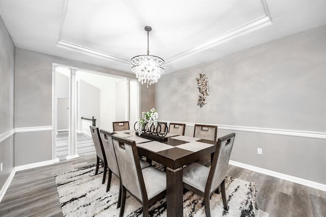 3 Wedgewood Ct, Edwardsville, IL 62025 - dining room with a raised ceiling, wood finished floors, a chandelier, and baseboards