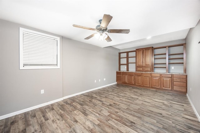 3 Wedgewood Ct, Edwardsville, IL 62025 - empty room with light wood-type flooring, baseboards, and a ceiling fan