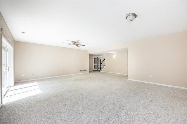 3 Wedgewood Ct, Edwardsville, IL 62025 - unfurnished room featuring stairway, a ceiling fan, light carpet, and baseboards