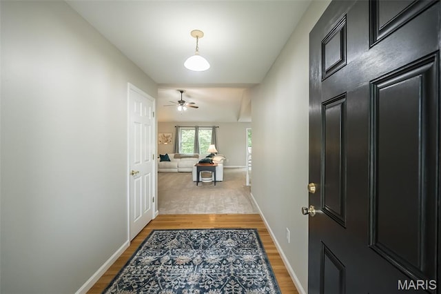 3414 Bedford Falls Dr, Wentzville, MO 63385 - entrance foyer with light wood finished floors, baseboards, and ceiling fan