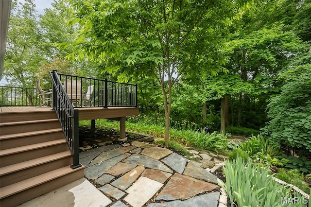3414 Bedford Falls Dr, Wentzville, MO 63385 - view of patio with a wooden deck and stairway