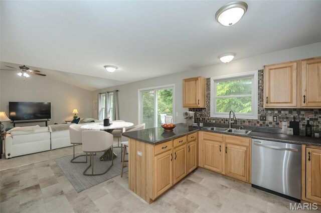 3414 Bedford Falls Dr, Wentzville, MO 63385 - kitchen with stainless steel dishwasher, a sink, decorative backsplash, light brown cabinetry, and open floor plan