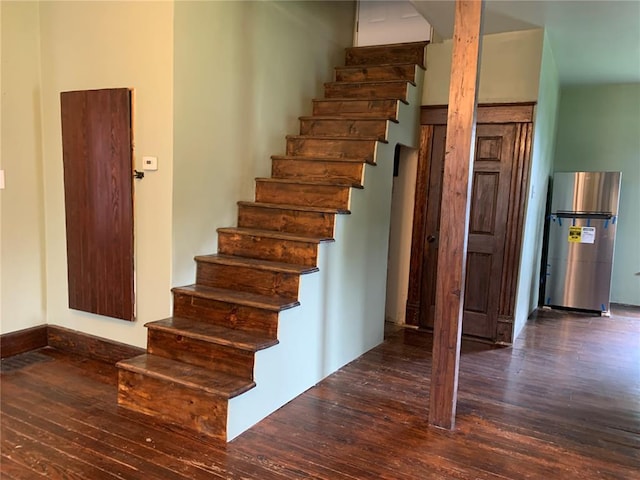 201 3rd St, Chaffee, MO 63740 - stairs featuring wood-type flooring