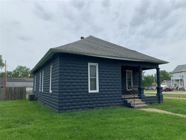 201 3rd St, Chaffee, MO 63740 - view of property exterior featuring central AC unit, a shingled roof, and a porch
