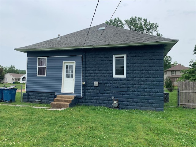 201 3rd St, Chaffee, MO 63740 - back of property featuring entry steps and roof with shingles