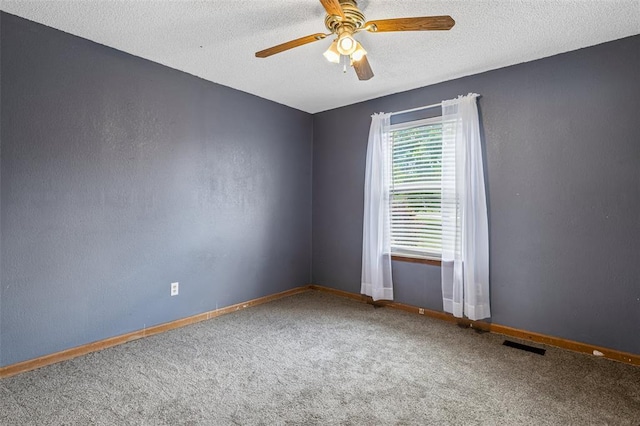 1111 Bluffview Dr, Desloge, MO 63628 - carpeted empty room featuring ceiling fan, baseboards, and a textured ceiling