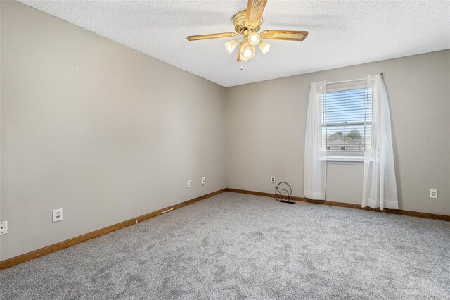 1111 Bluffview Dr, Desloge, MO 63628 - unfurnished room with a ceiling fan, carpet flooring, baseboards, and a textured ceiling
